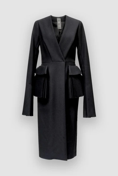 Zīda un vilnas mētelis ar krokotām kabatām